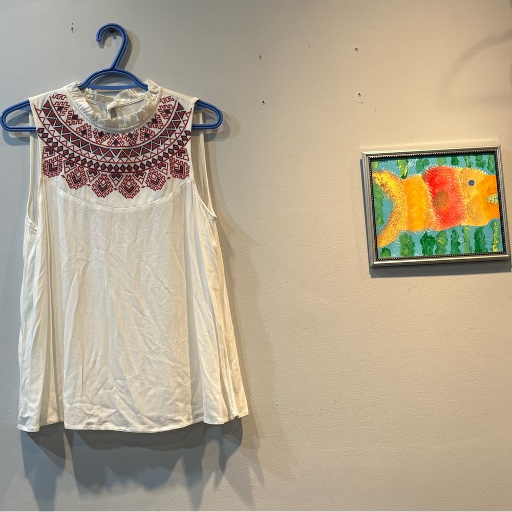 Chic Sleeveless Blouse with Red Embroidery